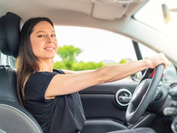 Woman Driving a Car