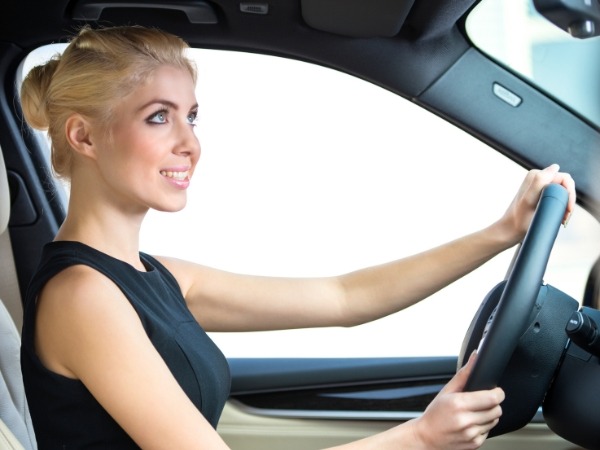 Woman Driving a Car