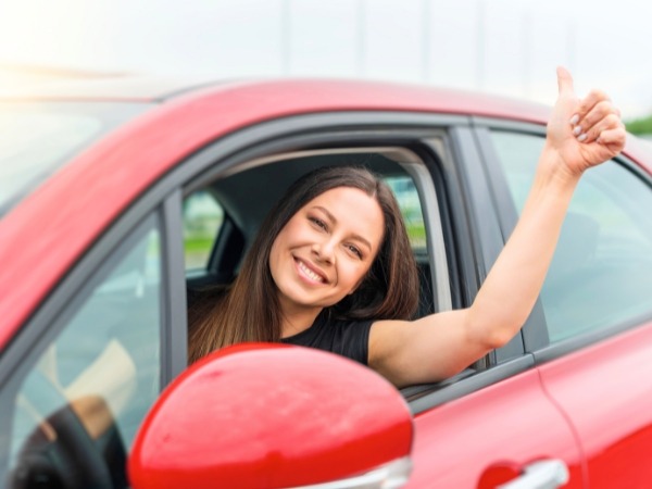 Woman Driving a Car