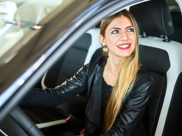 Woman Driving a Car