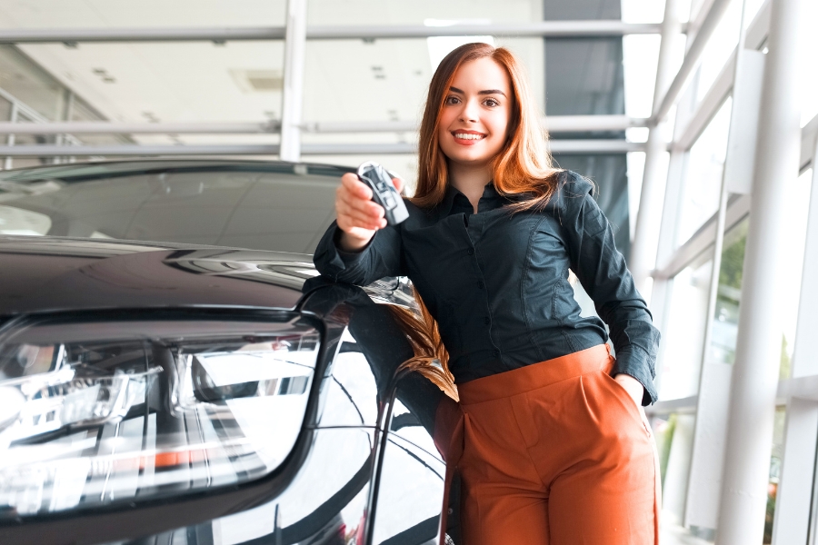 Woman with a Rental Car