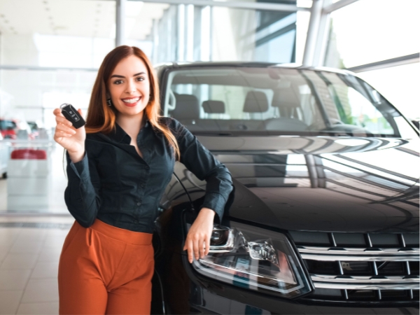 Woman with a Rental Car